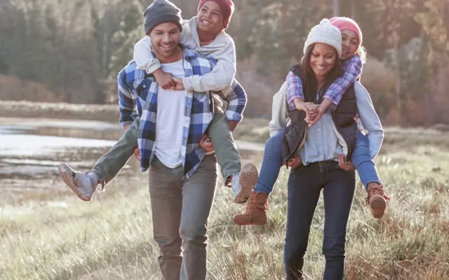 Family of four hiking and leaving a family legacy